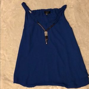 Blue sleeveless top with metal detailing